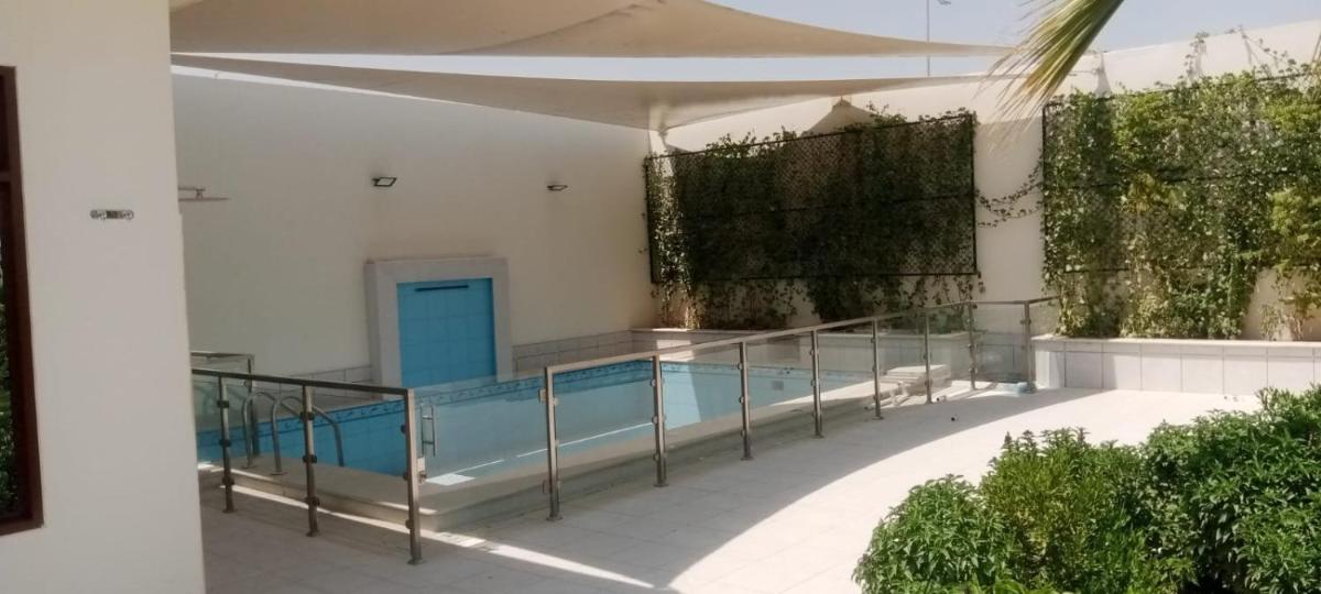 Alfarooq Palm Chalet