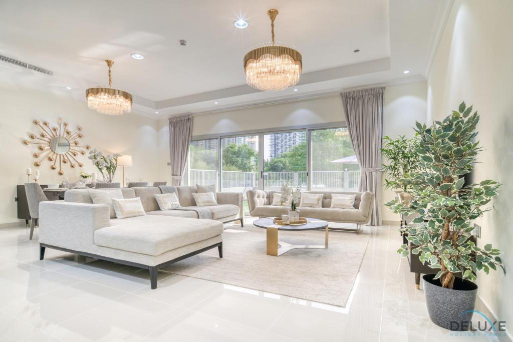 Charming 3BR Townhouse with Assistant’s Room at District 12 JVC by Deluxe Holiday Homes