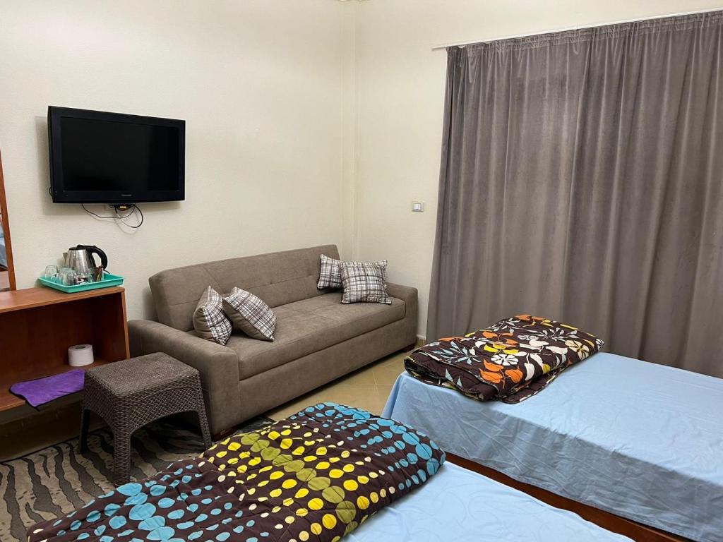 La sirena double room with mountain view, Families and couples only, Extra of 180 Egyptian pounds per adult person per stay, to be paid to the resort