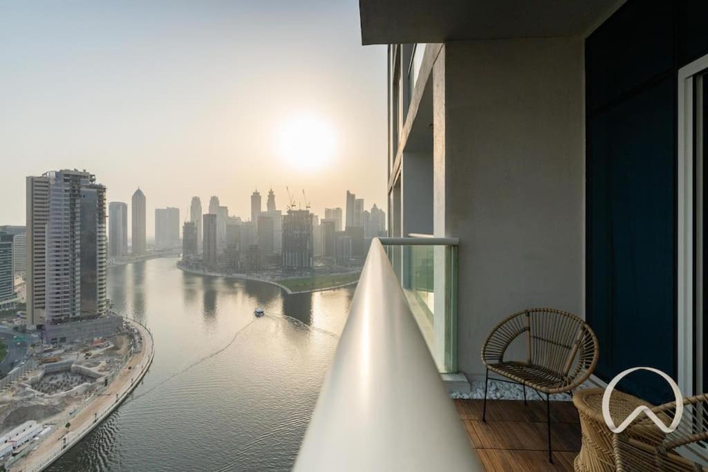 Oraya – Upgraded 2BR In Prive Maison, Central Canal View