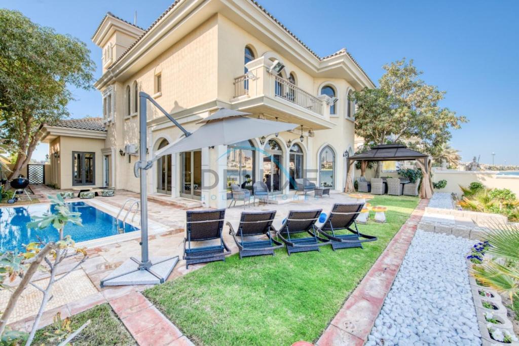 Prestigious 5BR Villa with Assistant Room and Private Pool in Frond O Palm Jumeirah by Deluxe Holiday Homes