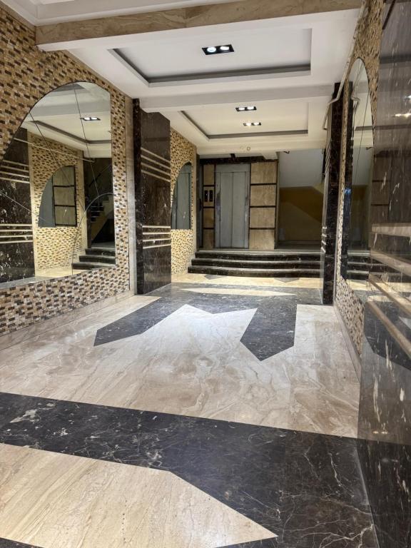شقه فندقيه بالمهندسين 3 غرف و 3 حمام
