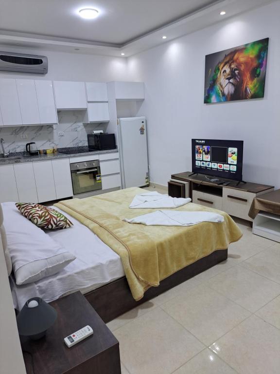 Beach front 2BR at elkarma hotel & aqua park