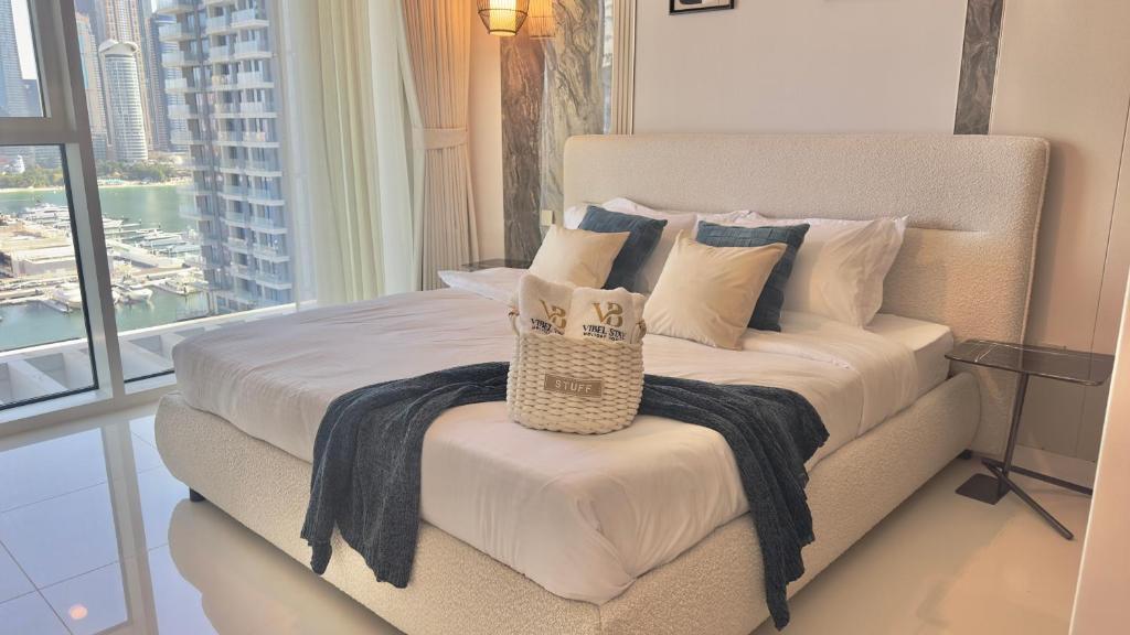 1BR Grand Bleu T2 with Palm View Emaar Beach Front by Vibel