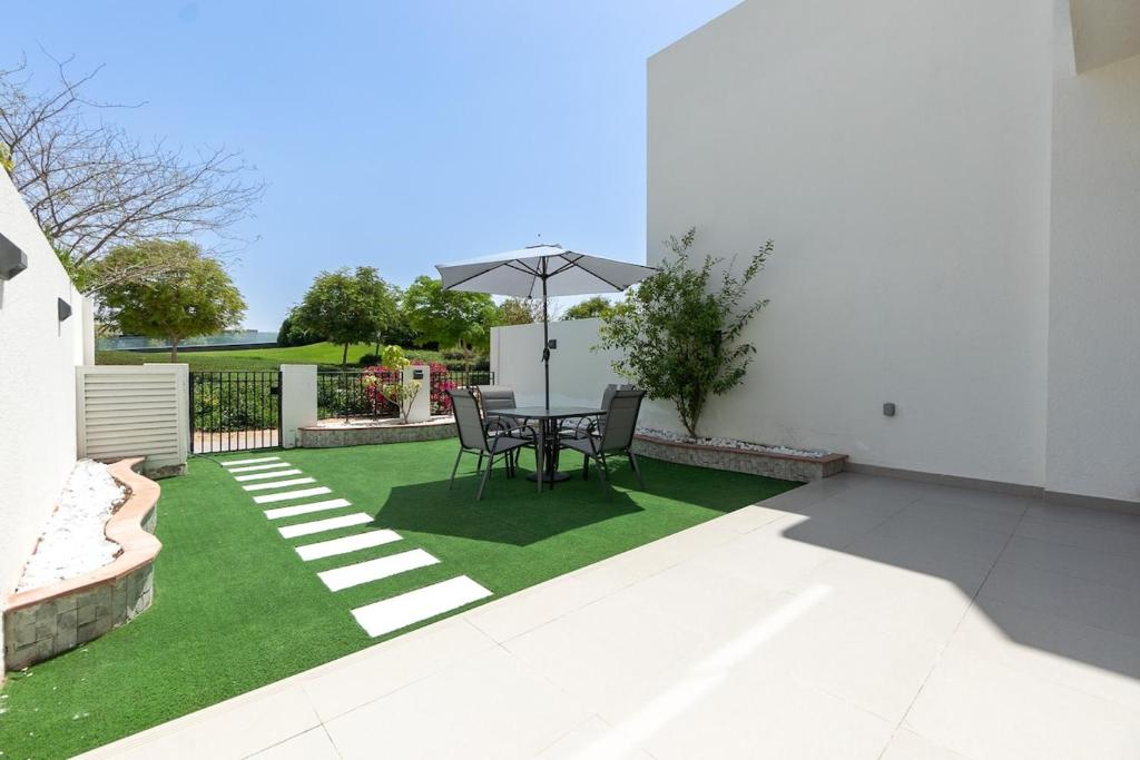 Elegant Stylish 3-Bedroom Villa at DAMAC Hills with Golf Course View