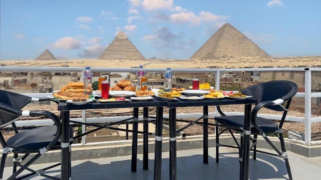 rizkyan pyramids view INN