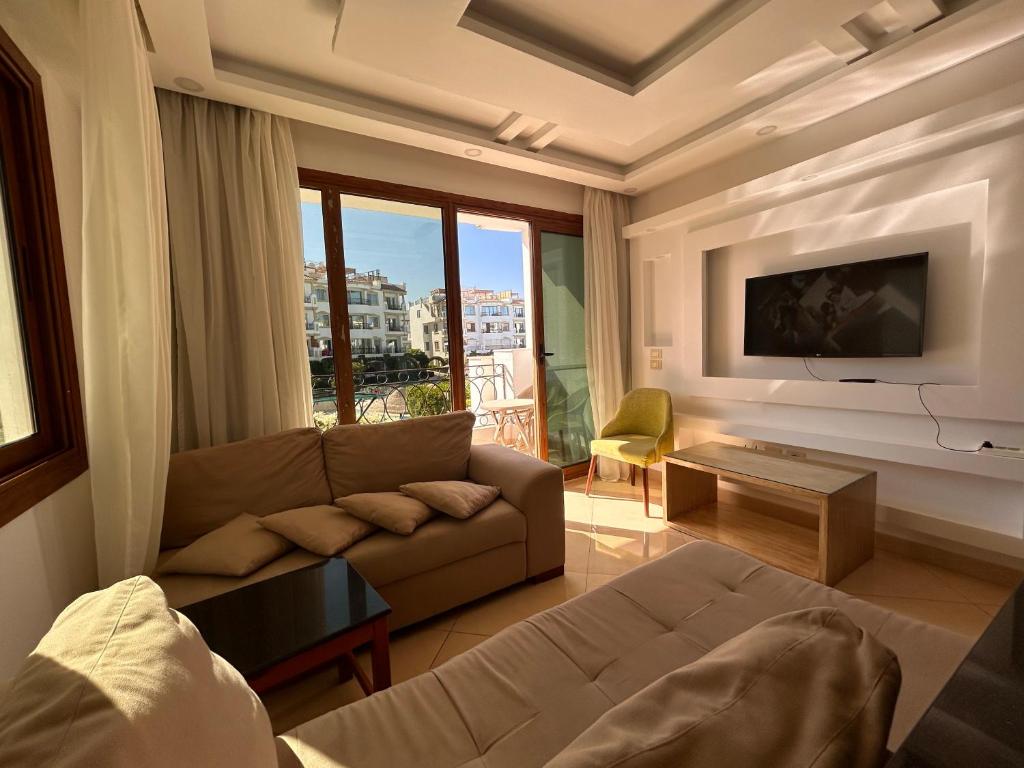 2-Bedroom Apartment on the Second Floor with a Balcony and amazing Pool View & Free Beach Access in Sharm Hills Resort