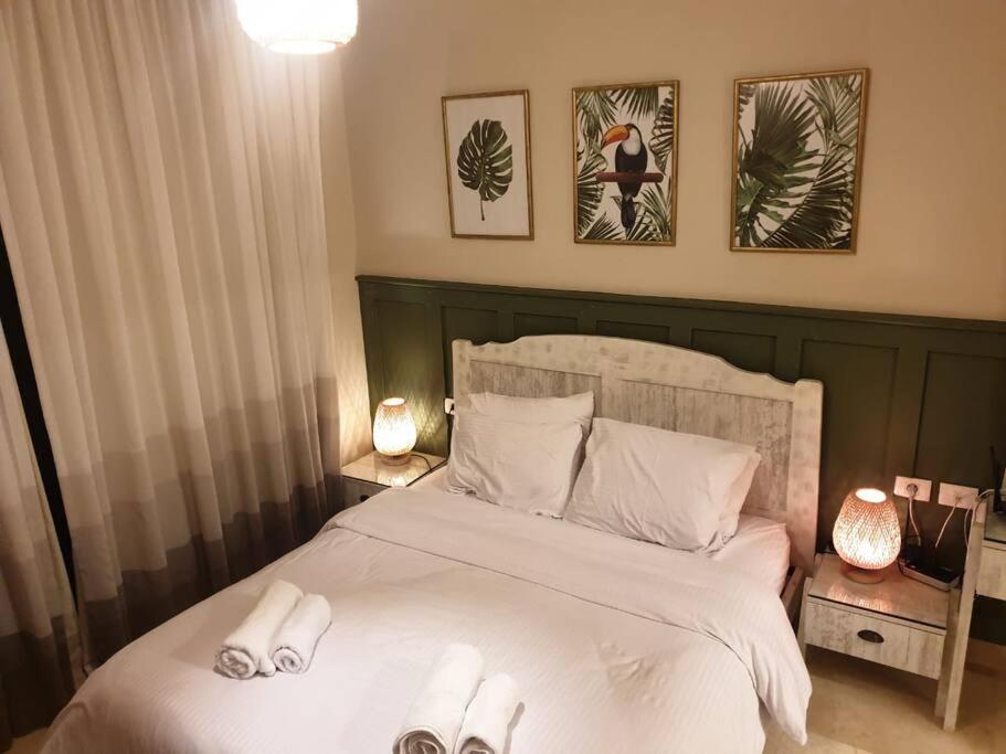 Mangroovy - 1BR GF +2 wall beds Garden & Pool view