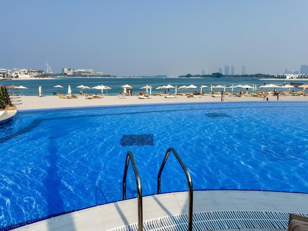 Modern beachfront 1BR apartment - Tiara Residence