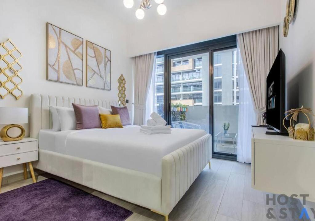 Cozy Studio in Azizi Rivera, MBR - Host & Stay