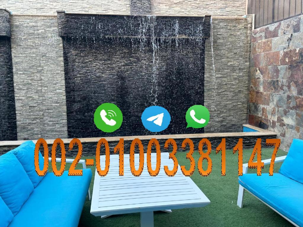 Trio villa with falls in compound فلا بحديقة كبيره وشلالات صناعية